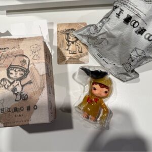 Pop Mart Hirono Little Figure with Yellow Outfit and Black Hat